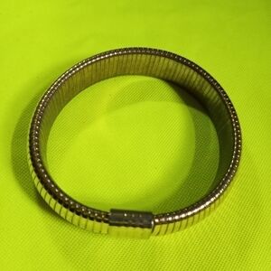 Goldtone stretch Bangle bracelet sleeve holder 2.5 i.d.